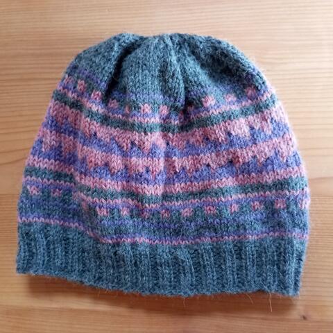 Warm soft hand knitted beanie, perfect for keeping you warm during winter days